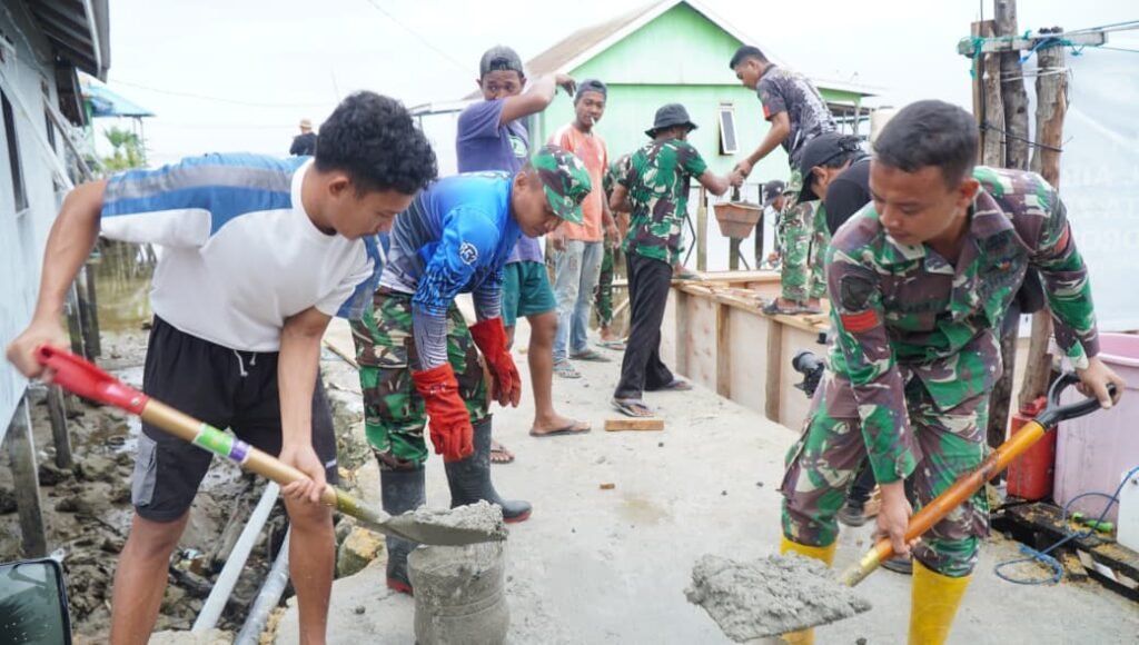 Kolaborasi Satgas TMMD dan Warga Percepat Pembangunan Manunggal Air Bersih di Desa Umbele Kolaborasi Satgas TMMD dan Warga Percepat Pembangunan Manunggal Air Bersih di Desa Umbele
