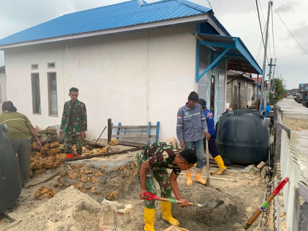 Gotong Royong Satgas TMMD dan Warga Rampungkan Pengecoran Dudukan Tandon Air di Desa Umbele Lama Gotong Royong Satgas TMMD dan Warga Rampungkan Pengecoran Dudukan Tandon Air di Desa Umbele Lama