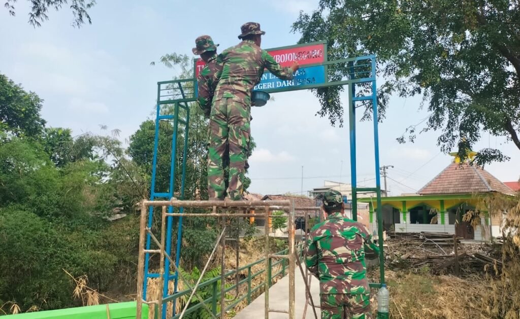 Menyambung Asa di Brang Etan: Senyum Warga Kesongo Saat TMMD 129 Bojonegoro Bangun Jembatan Impian Menyambung Asa di Brang Etan: Senyum Warga Kesongo Saat TMMD 129 Bojonegoro Bangun Jembatan Impian