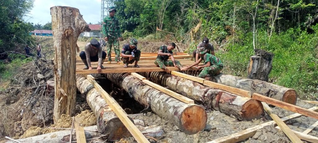 TNI-Polri dan Warga Kompak, Pembangunan Jembatan Danau Belatung Terus Dikebut TNI-Polri dan Warga Kompak, Pembangunan Jembatan Danau Belatung Terus Dikebut