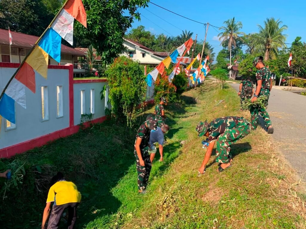 Semangat Gotong Royong Warnai Bersih-Bersih Desa Ulak Pauk, Satgas TMMD 129 Kodim 1206/Putussibau dan Warga Kompak Jaga Lingkungan Semangat Gotong Royong Warnai Bersih-Bersih Desa Ulak Pauk, Satgas TMMD 129 Kodim 1206/Putussibau dan Warga Kompak Jaga Lingkungan
