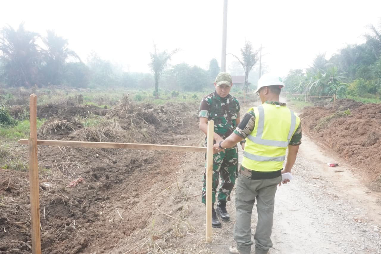 Pembangunan Jalan TMMD di Parumpanai: Meningkatkan Kesejahteraan Melalui Akses Lebih Baik